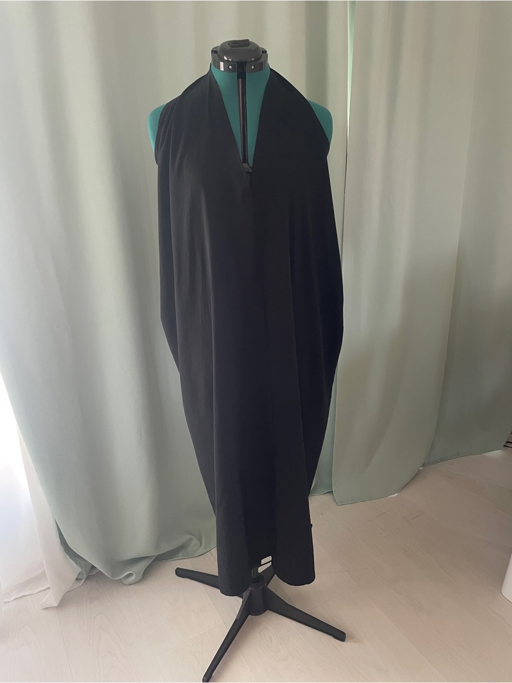 Black deep V-neck cut dress. Meg designer NY.